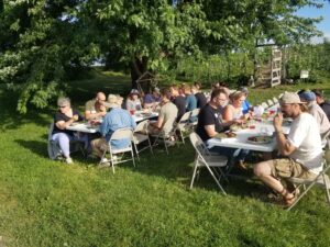 Attendants share a meal at Organic Compound farm visit