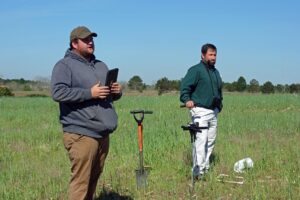 Instructors discuss assesment of various cover crops.