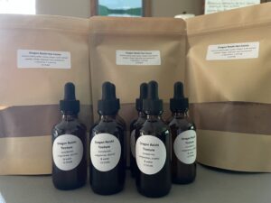 Processed mushrooms ready for distribution in tincture and hot cocoa form