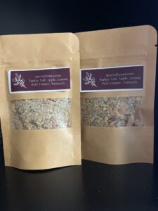 Mack's favorite tea blend: turkey tail concentrated extract powder (grown on site), lemon peel, ginger, turmeric, and freeze dried apple (grown on site). A regular gift to community members.