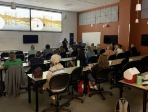 Presenters speaks to classroom