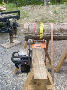 Figure 1. Chainsaw jig aligning saw bar with section prior to cutting section.