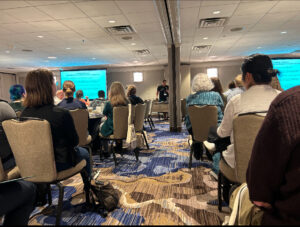ABBA founder Melanie Kirby giving presentation of ABBA at American Bee Research Conference January 2024