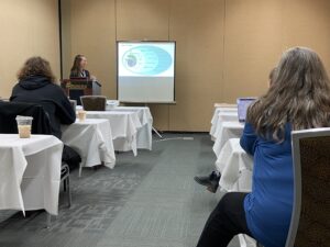 Dr. Caley Gasch with the University of Alaska Fairbanks discusses Soil Health with Alaskans at the Second Annual Alaska Farm Convention and Trade Show.