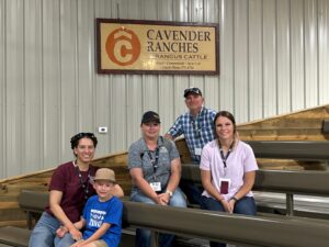 5 people touring cattle farm in Texas