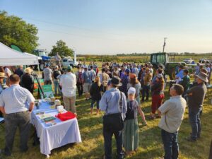Programming partner Sam Oschwald-Tilton, Glacial Drift Enterprises, kicks off the event with announcements at the MWCFD’s trade show area. Photo by Ashley Adair