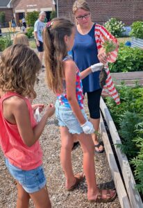  Discussing root systems on the morning of July 4th.