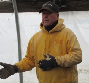 Pooh describing the crop harvesting and washing procedures they use on the farm during the farm tour.
