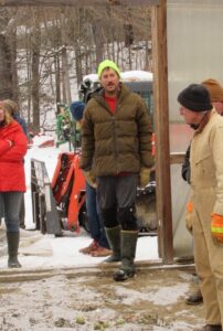 Ray Sprague of Edgewater Farm, explaining the tomato production methods he uses on the farm he co-owns with his father, Pooh Sprague 