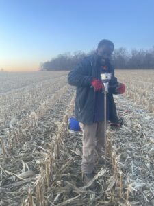 Researcher taking soil samples and measuring penetration resistance (December 2023).