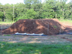 SHAPED MANURE PILE AWAITING BIOFILTER