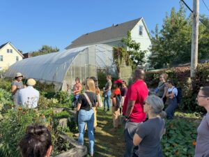 group of people standing on urban farm