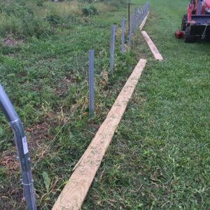 high tunnel ground posts and baseboards