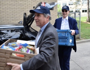 Senators Sherrod Brown and Ron Wyden Delivering Food From a rescue