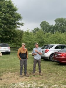 Farmers, Zach and Seth Dobbelaer, give introduction and background to OEFFA farm tour attendees.  