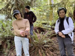 Jade visits a volunteer's property to consult on growing mushrooms