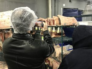 Farmer learning on Butcher Shop Tour