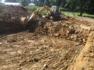 Excavation for geothermal piping