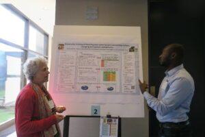 Discussion of poster with UVM graduate student, Richmond Baye