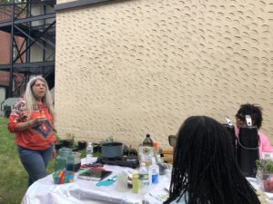 Michaeline Picaro teaches a workshop on Indigenous medicinal herbalism with a handson demonstration on making salves from herbs that will be planted in the raised beds.