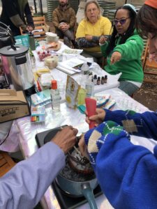 Michaeline Picaro teaches a workshop on Indigenous medicinal herbalism with a handson demonstration on making salves from herbs that will be planted in the raised beds.