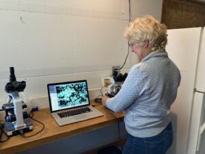 Monique Bosch and microscope work
