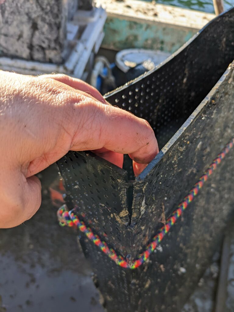 A split weld on an HDPE bag
