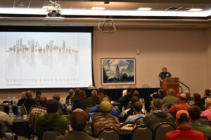 TPC staff member speaking at the 2023 Iowa Native Roadside Conference.