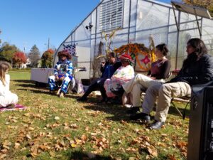 Story telling by Wixaritari  elders at Harvest Celebration at Kalamazoo College.  Photo by Zuleyja Prieto