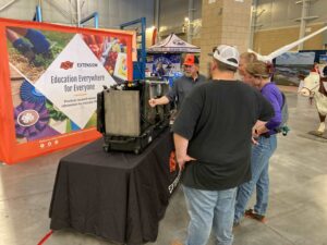 Sprayer array at the Oklahoma Farm Show catches the attention of farmers.